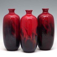 Lot 149 - Three Royal Doulton flambe vases