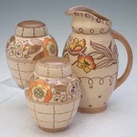 Lot 158 - Two Charlotte Rhead ginger jars and ewer, formerly the property of Jim Bee, mould and model maker for Woods & Sons, Burslem.