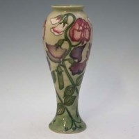 Lot 169 - Moorcroft collectors club tall vase.