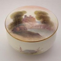 Lot 192 - Royal Worcester pill box and cover painted with a castle and rivwer scene signed R. Rushton date code for 1921.