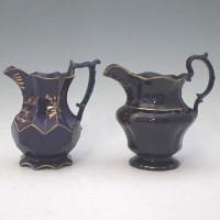 Lot 204 - Two blue glazed jugs dated 1821 and 1839.