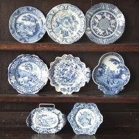 Lot 210 - Four small blue transfer plates and four dishes.