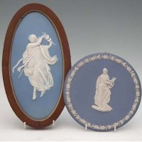 Lot 242 - Two Wedgwood blue japser plaques,   decorated
