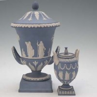 Lot 244 - Two Wedgwood jasper twin handled lidded vases