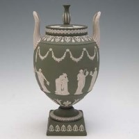 Lot 251 - Wedgwood green jasper ware lidded vase   with