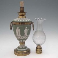Lot 252 - Wedgwood green jasper oil lamp  decorated with