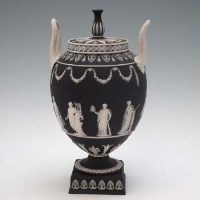 Lot 254 - Wedgwood black jasper lidded vase   with twin