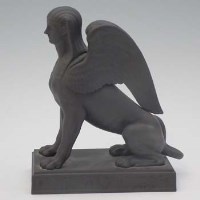 Lot 269 - Wedgwood black basalt sphinx   modelled seated on