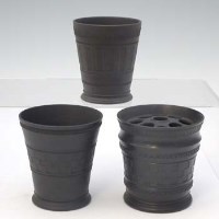 Lot 275 - Three Wedgwood engine turned and signed vases