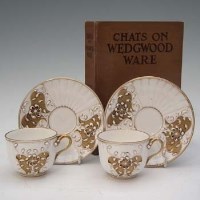 Lot 311 - Two Wedgwood cups and saucers as well as Chats on Wedgwood Ware with authors inscription.