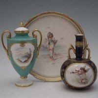 Lot 325 - Two Minton twin handled vases and a plate