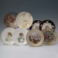 Lot 335 - Seven Minton plates and a footed dish,   two