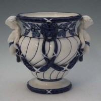 Lot 338 - Minton Jardiniere   mouded with twin cherub