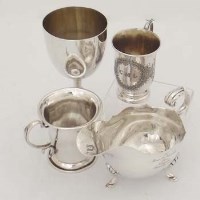 Lot 381 - Two silver christening mugs; trophy goblet; sauce
