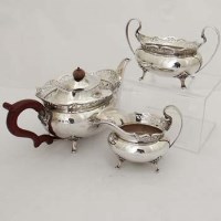 Lot 384 - Three-piece silver teaset.