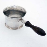 Lot 390 - George I Britannia silver brandy pan, Wm Fleming