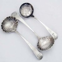Lot 400 - Pair of George III sauce ladles and a Victorian sifter spoon