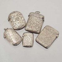Lot 412 - Five various silver vestas cases with engraved