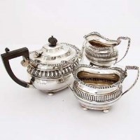 Lot 422 - George III style silver batchelor's tea set