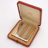 Lot 424 - Cartier of London silver cigarette case given to