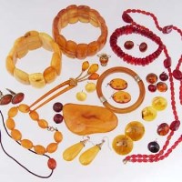 Lot 430 - Group of amber and copal jewellery including bracelets, earrings and brooches