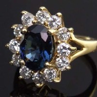 Lot 436 - Sapphire and diamond oval cluster ring, approximately 3ct.