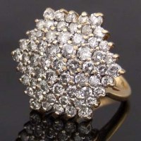 Lot 443 - 18ct gold diamond melee cluster ring, the