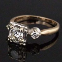 Lot 451 - 14k three-stone diamond ring.