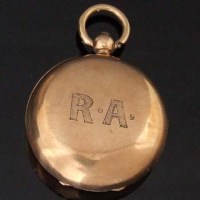 Lot 452 - Gold coin holder.