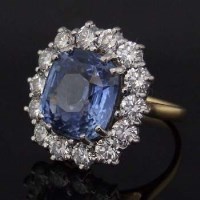 Lot 453 - Ceylon sapphire cluster ring, 9.76ct, surrounded