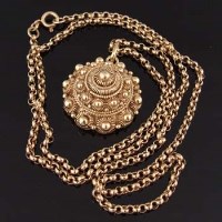 Lot 464 - Indian style pendant on 9ct gold belcher necklace