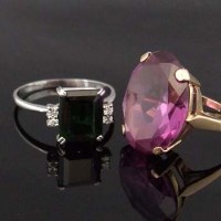 Lot 486 - Unmarked white gold ring set with an emerald cut