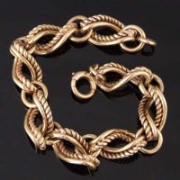 Lot 496 - 9ct gold twist link bracelet chain, length 18cm