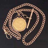 Lot 507 - 9ct gold watch chain with sovereign fob.