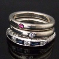 Lot 515 - Platinum sapphirre and diamond channel set ring