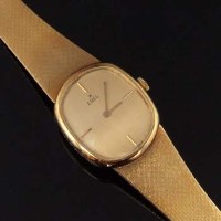Lot 533 - An 18ct gold Ebel watch