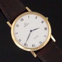 Lot 536 - Omega de Ville 18ct gold wristwatch on leather strap.