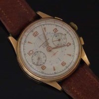 Lot 537 - 18ct gold Swiss chronograph