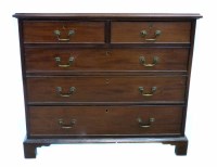 Lot 492 - George III mahogany chest of two short and three long graduated drawers