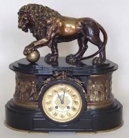 Lot 745 - Slate mantel clock decorated with Lion.