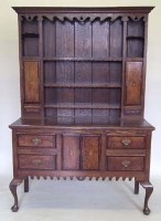 Lot 767 - 18th century style oak dresser banded in mahogany