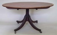Lot 809 - Mahogany oval tip-top breakfast table banded in satinwood