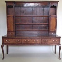Lot 830 - 18th century oak dresser banded in mahogany