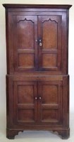 Lot 831 - George III oak floor standing corner cupboard