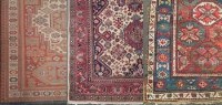 Lot 835 - Three rugs.