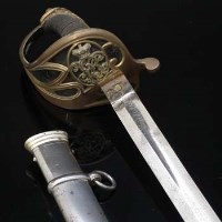 Lot 60 - Victorian officers sword with leather covers.