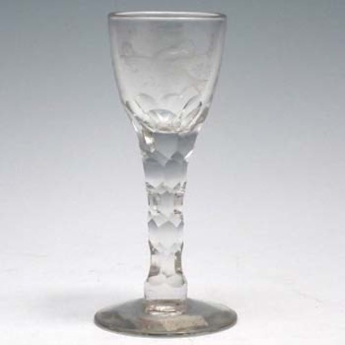 Lot 84 - Facetted stem wine glass.