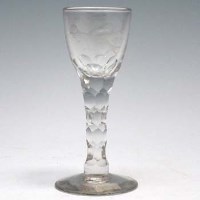 Lot 84 - Facetted stem wine glass.