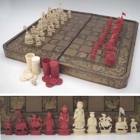 Lot 90 - Ivory chess set in case (and draughts).