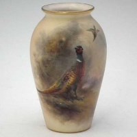 Lot 132 - Royal Worcester sabrina vase painted with a pheasant by James Stinton signed date code for 1910.